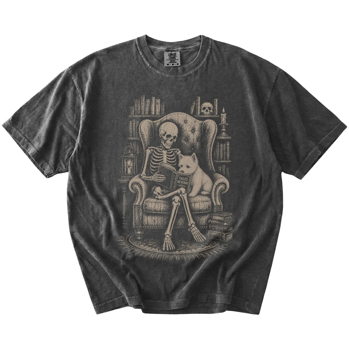 Skeleton reading in a library beside a Westie on a Pepper Comfort Colors® T-shirt
