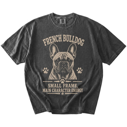 French Bulldog design with “Small Frame, Main Character Energy” lettering on a Pepper Comfort Colors® T-shirt