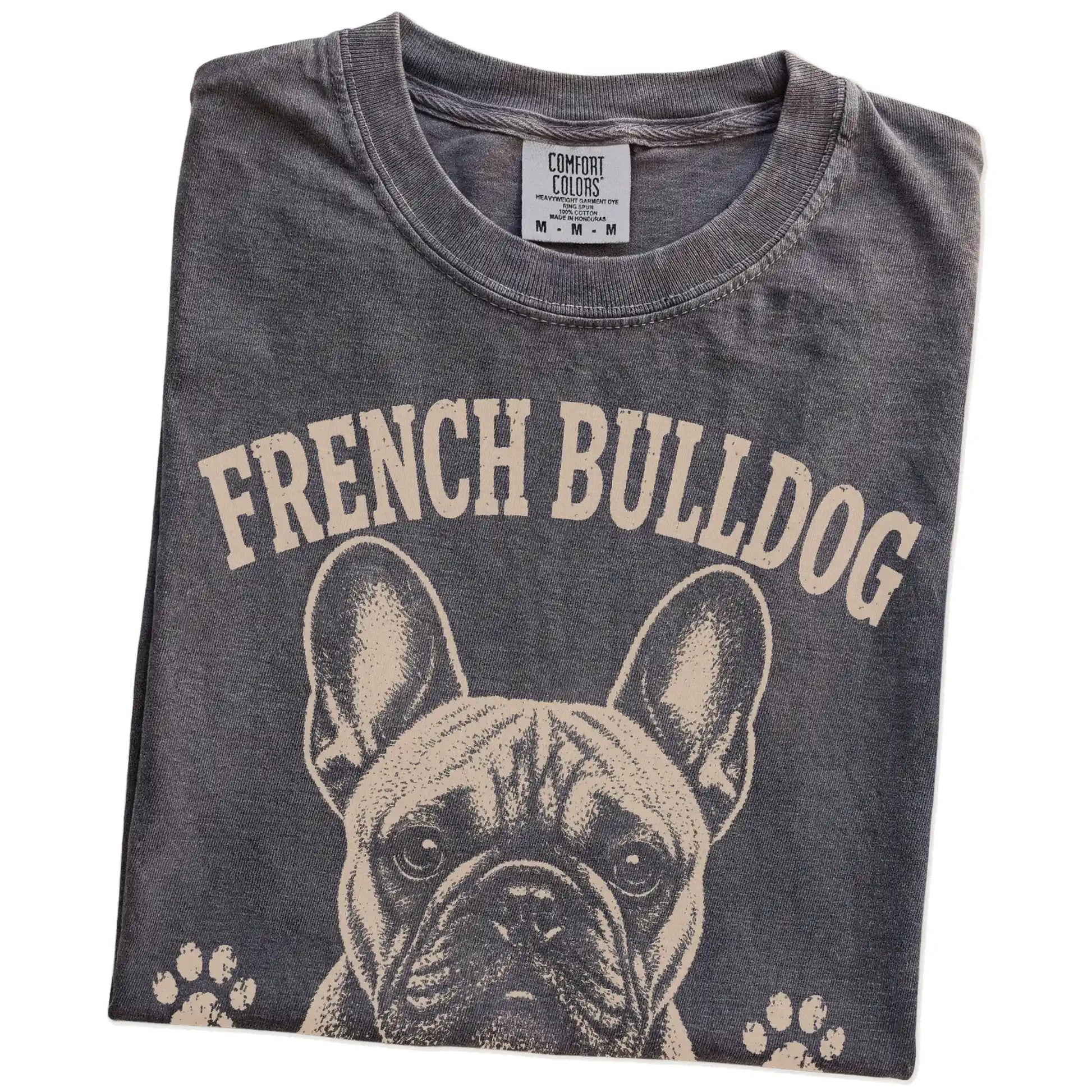 Folded Pepper Comfort Colors® T-shirt showing French Bulldog design with “Small Frame, Main Character Energy” lettering