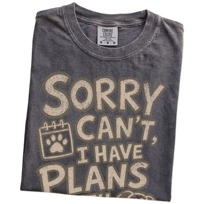 Folded Pepper Comfort Colors® T-shirt showing sorry can't i have plans with my dog lettering