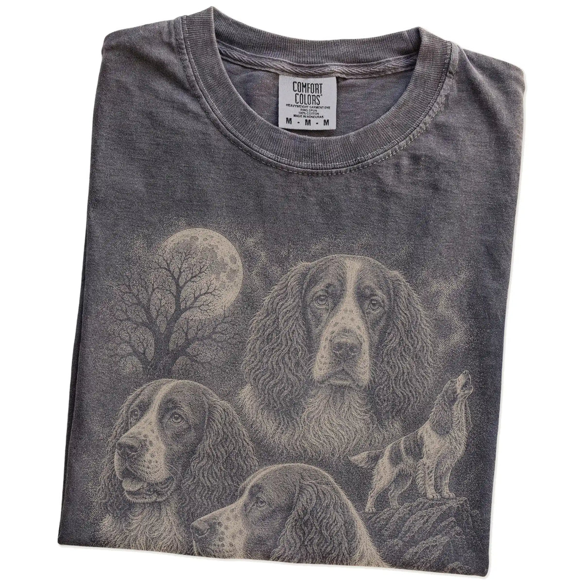 Folded Pepper Comfort Colors® T-shirt showing a vintage moon montage featuring Springer Spaniel