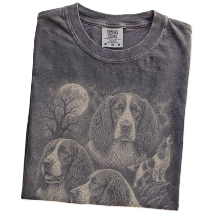 Folded Pepper Comfort Colors® T-shirt showing a vintage moon montage featuring Springer Spaniel