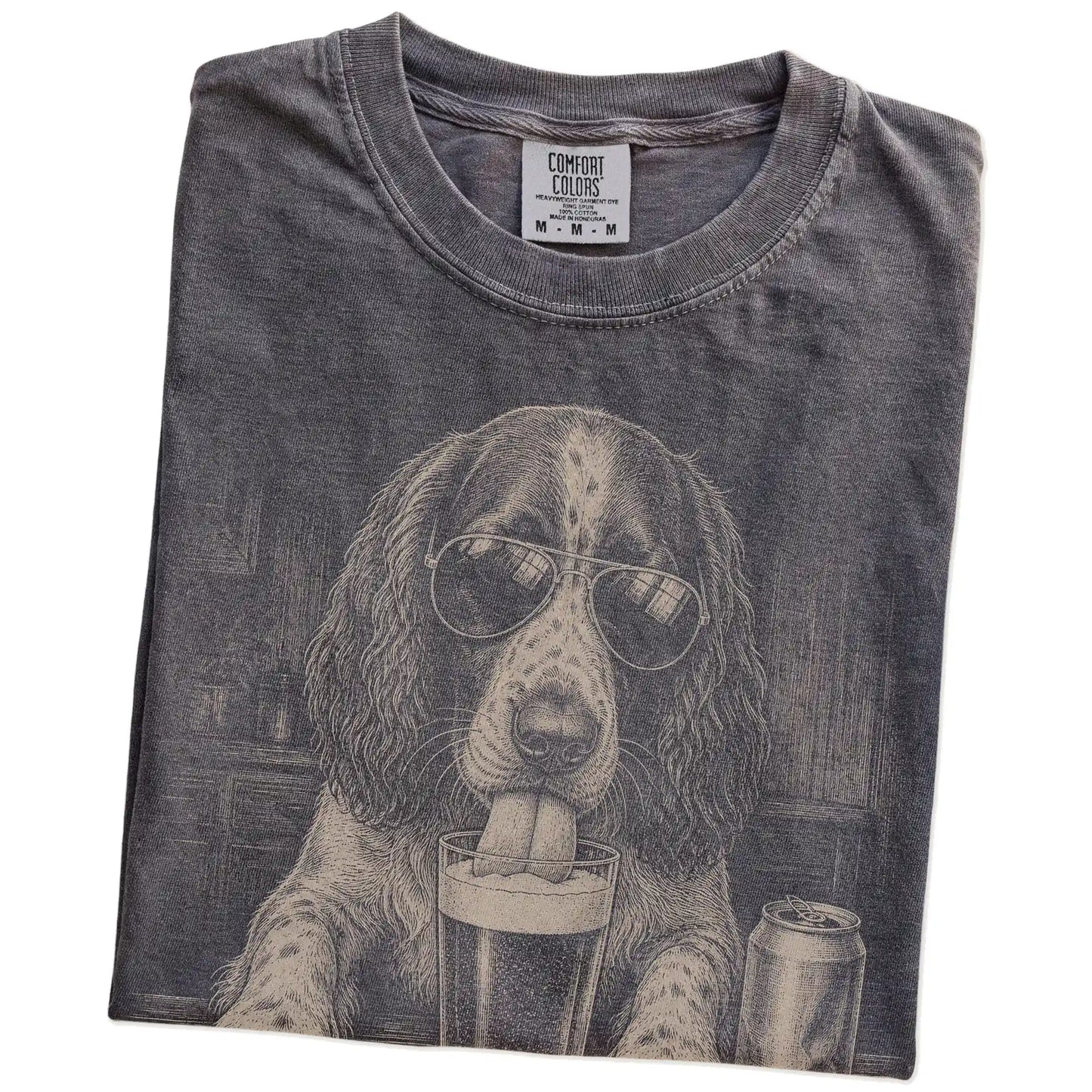 Folded Pepper Comfort Colors® t-shirt showing Springer Spaniel sneaking a drink from a pint