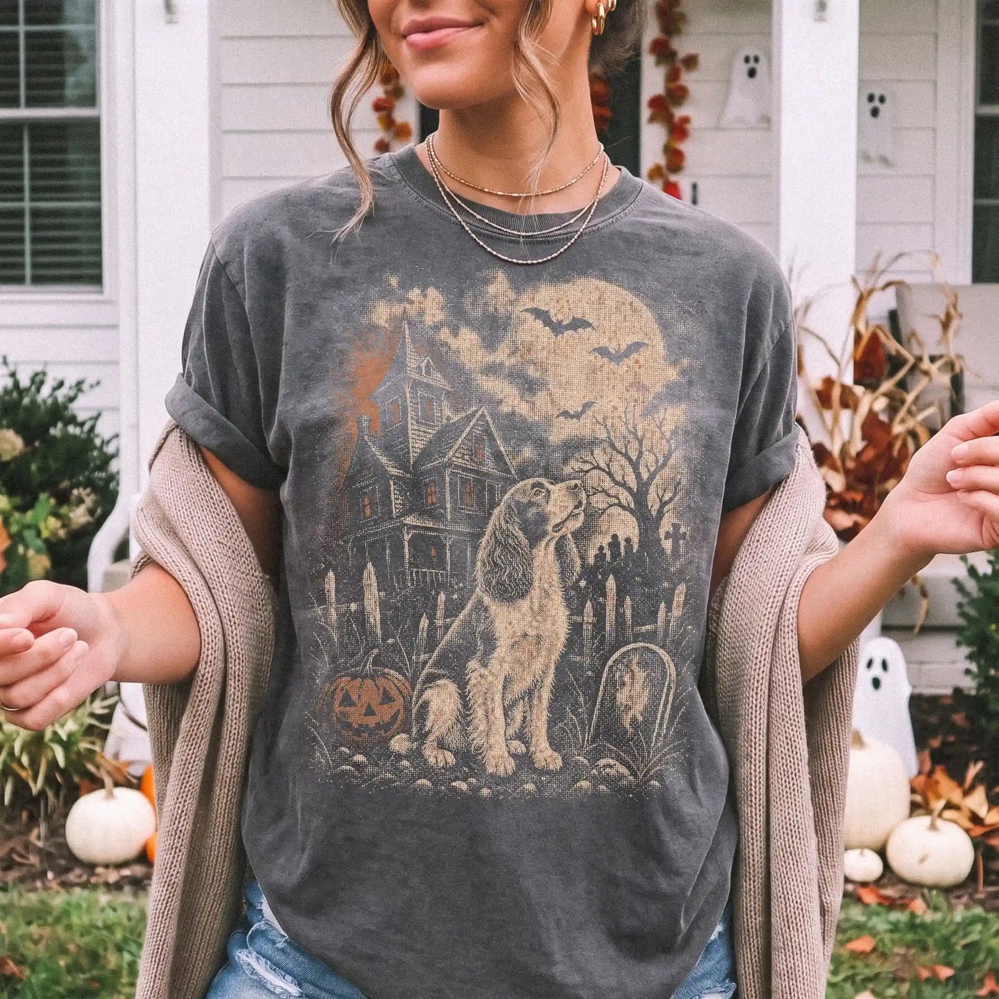 Model wearing a Pepper Comfort Colors® T-shirt showing Springer Spaniel in a vintage haunted-house scene