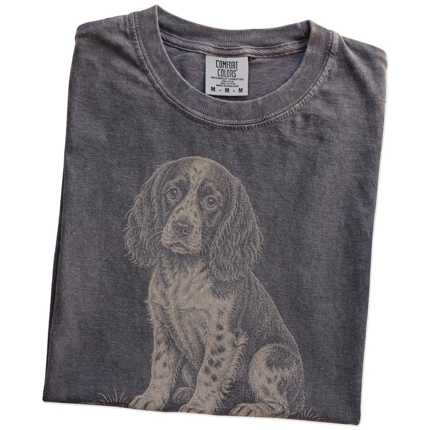 Folded Pepper Springer Spaniel Karma T-Shirt showing the graphic