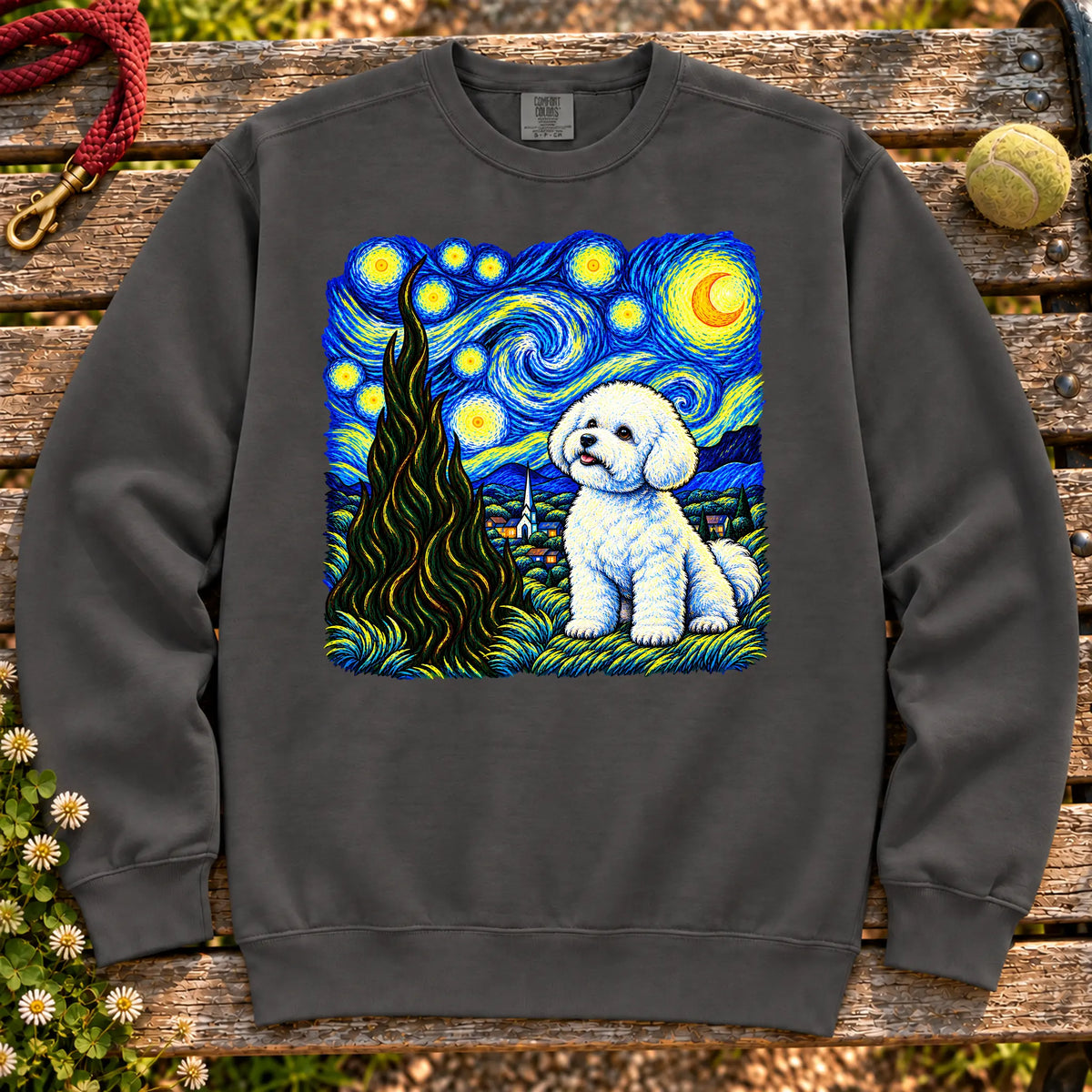 Colorful Bichon Frise beneath a swirling starry night sky on a Pepper sweatshirt