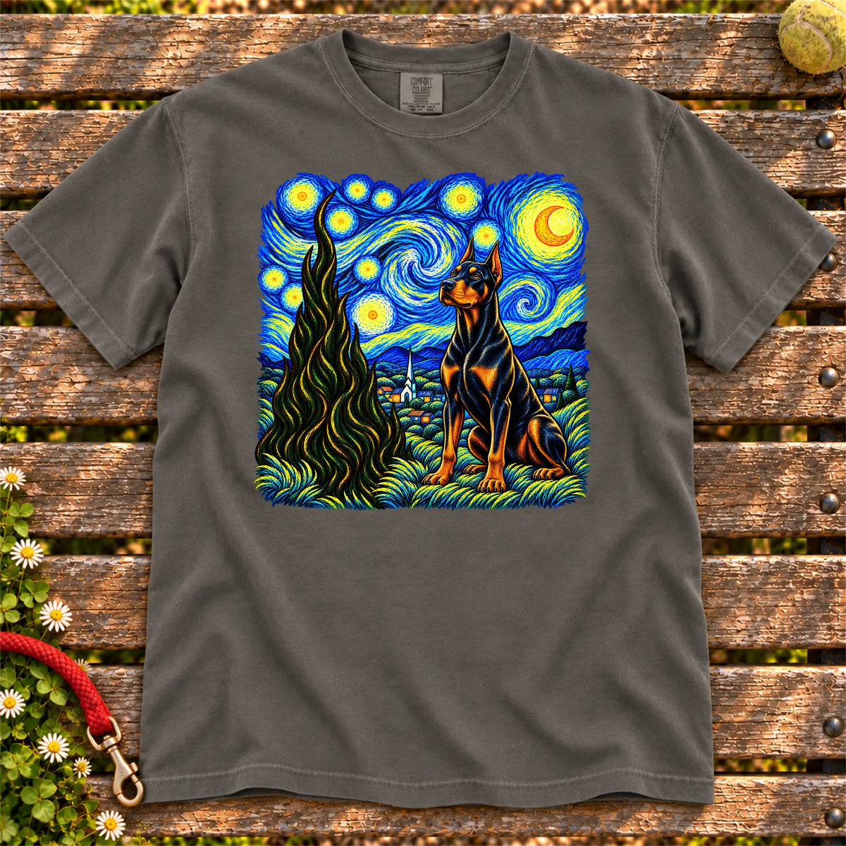 Colorful Doberman beneath a swirling starry night sky on a Pepper T-shirt
