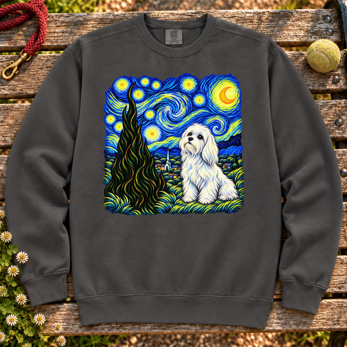 Colorful Maltese beneath a swirling starry night sky on a Pepper sweatshirt