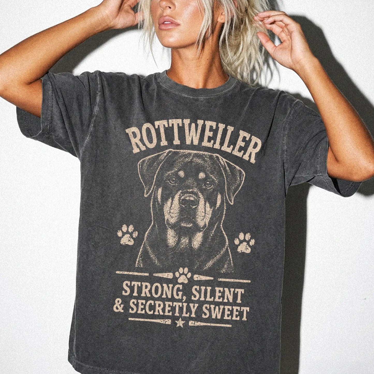 Model wearing a Pepper Comfort Colors® T-shirt featuring Rottweiler design with “Strong, Silent & Secretly Sweet” lettering