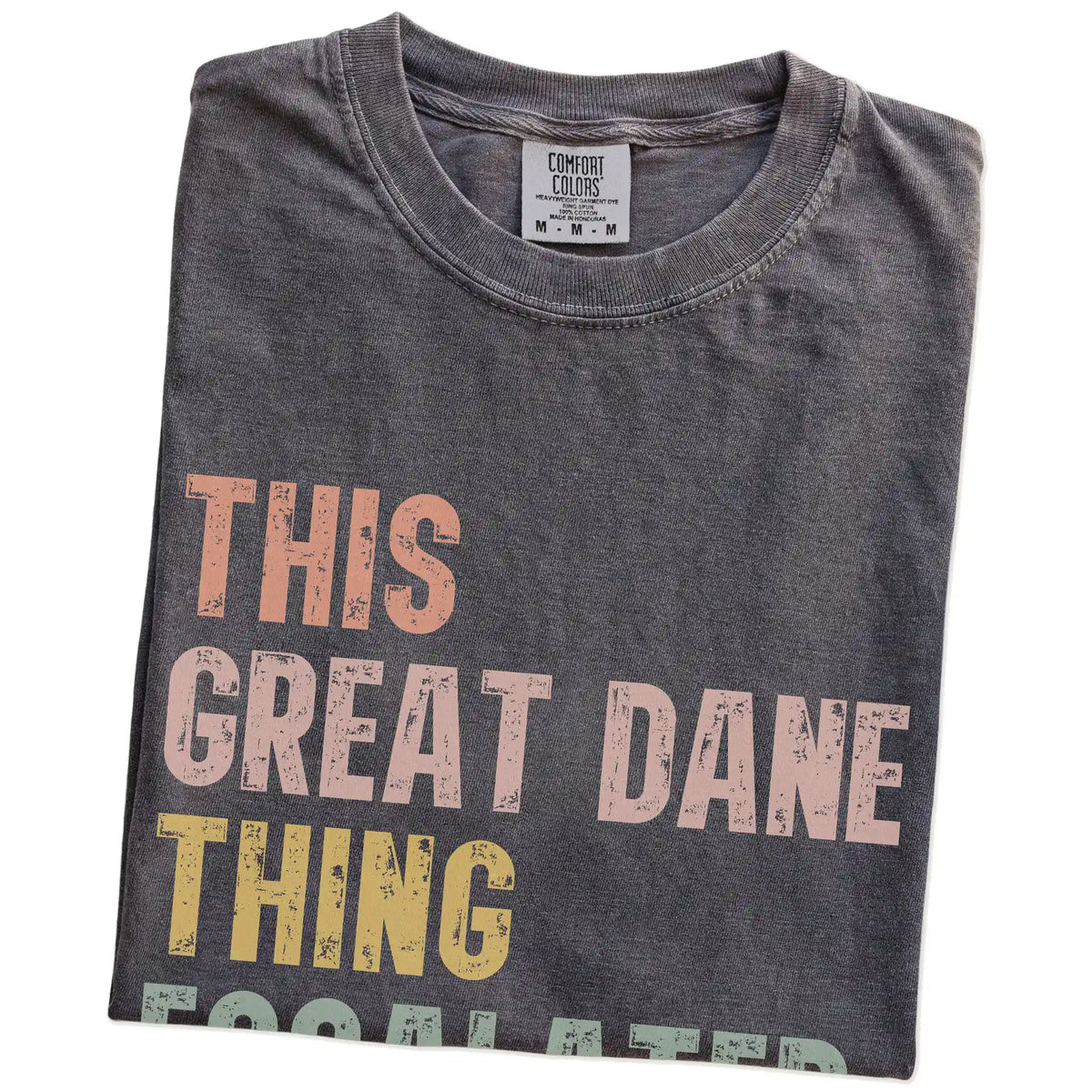 Folded Pepper Comfort Colors® T-shirt showing retro “This Great Dane Thing Escalated Quickly” lettering