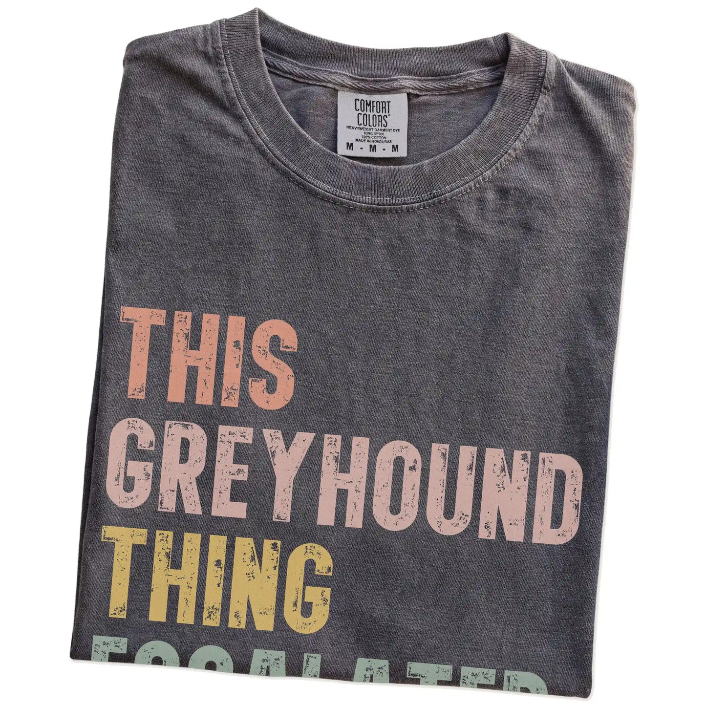Folded Pepper Comfort Colors® T-shirt showing retro “This Greyhound Thing Escalated Quickly” lettering