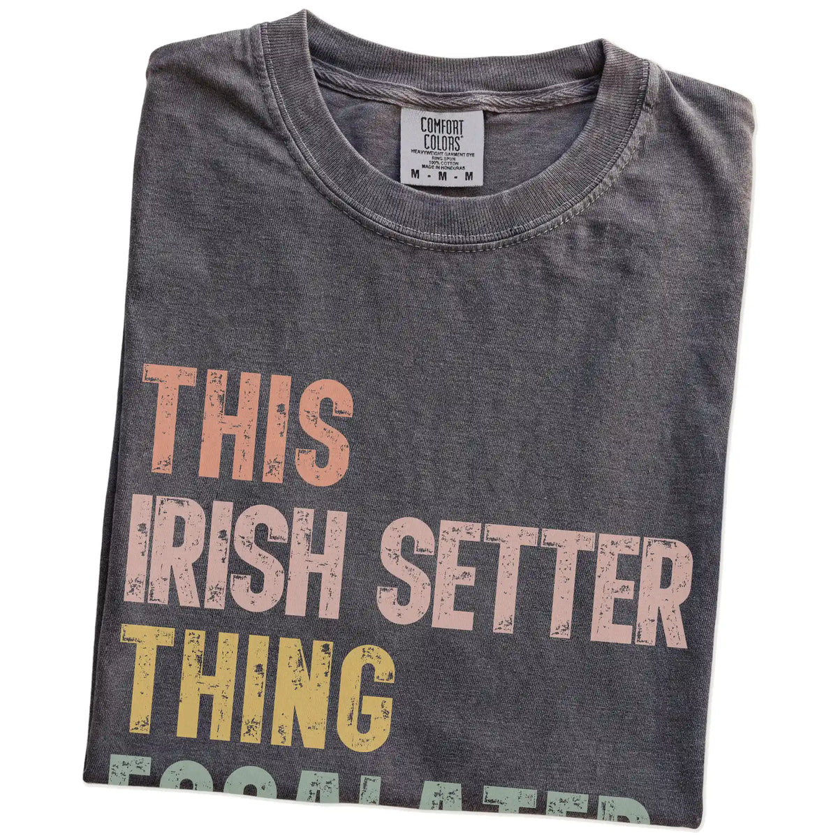 Folded Pepper Comfort Colors® T-shirt showing retro “This Irish Setter Thing Escalated Quickly” lettering