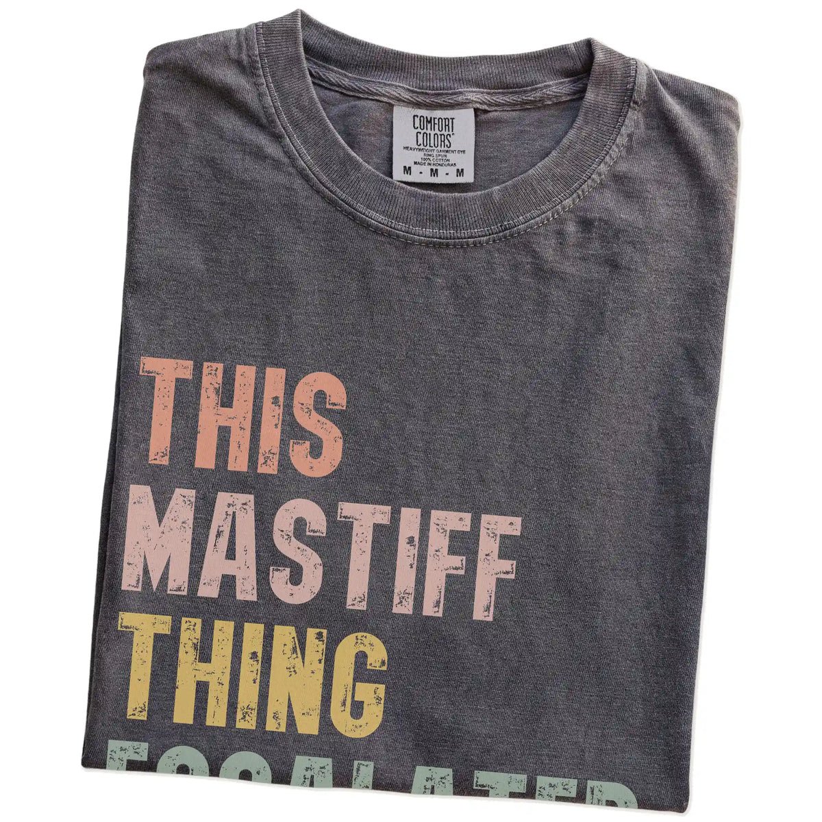 Folded Pepper Comfort Colors® T-shirt showing retro “This Mastiff Thing Escalated Quickly” lettering