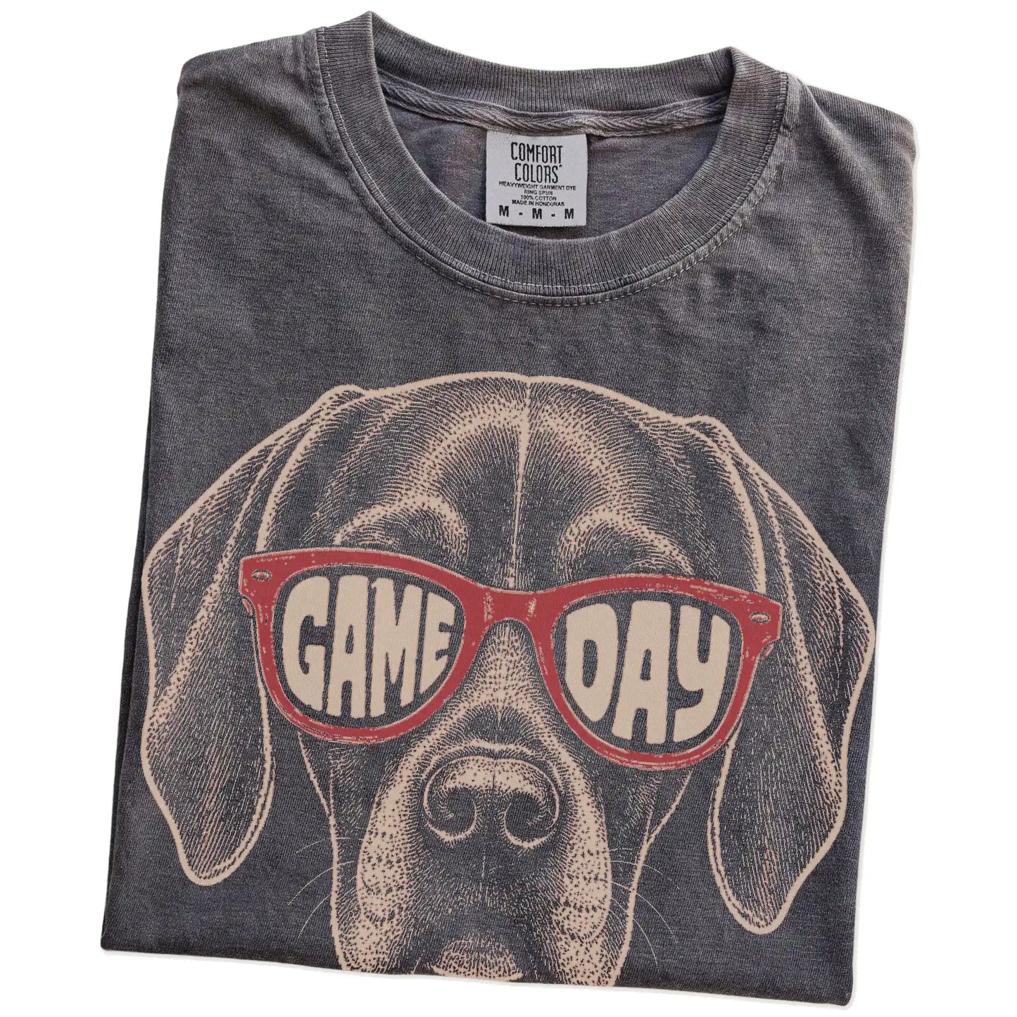 Folded Pepper Comfort Colors® T-shirt showing vizsla wearing red game day sunglasses