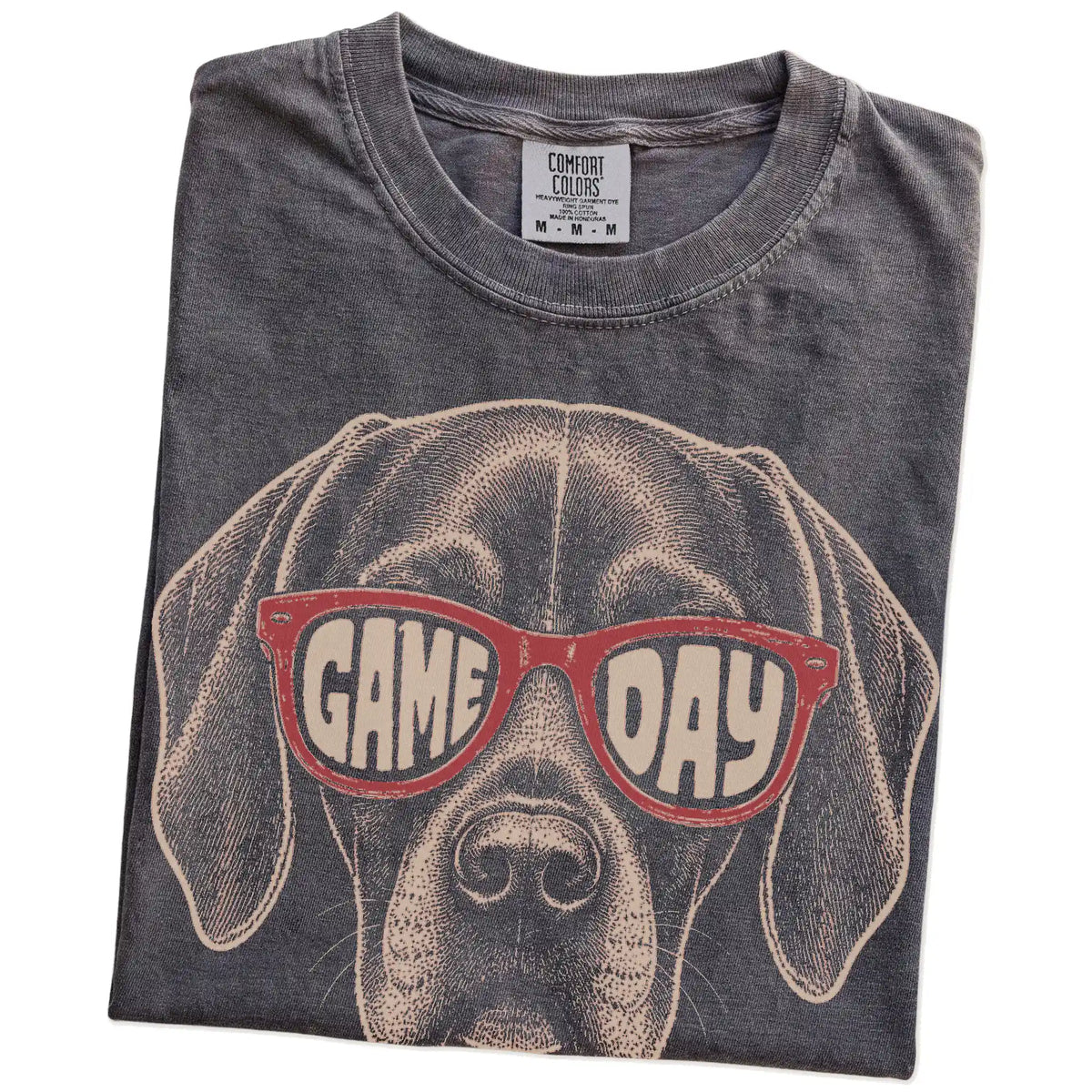 Folded Pepper Comfort Colors® T-shirt showing vizsla wearing red game day sunglasses