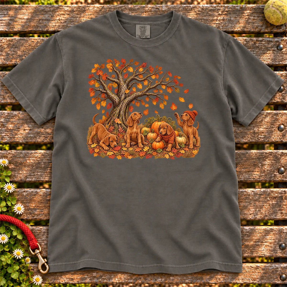 Four Vizsla puppies with pumpkins beneath an autumn tree on a Pepper garment-dyed T-shirt