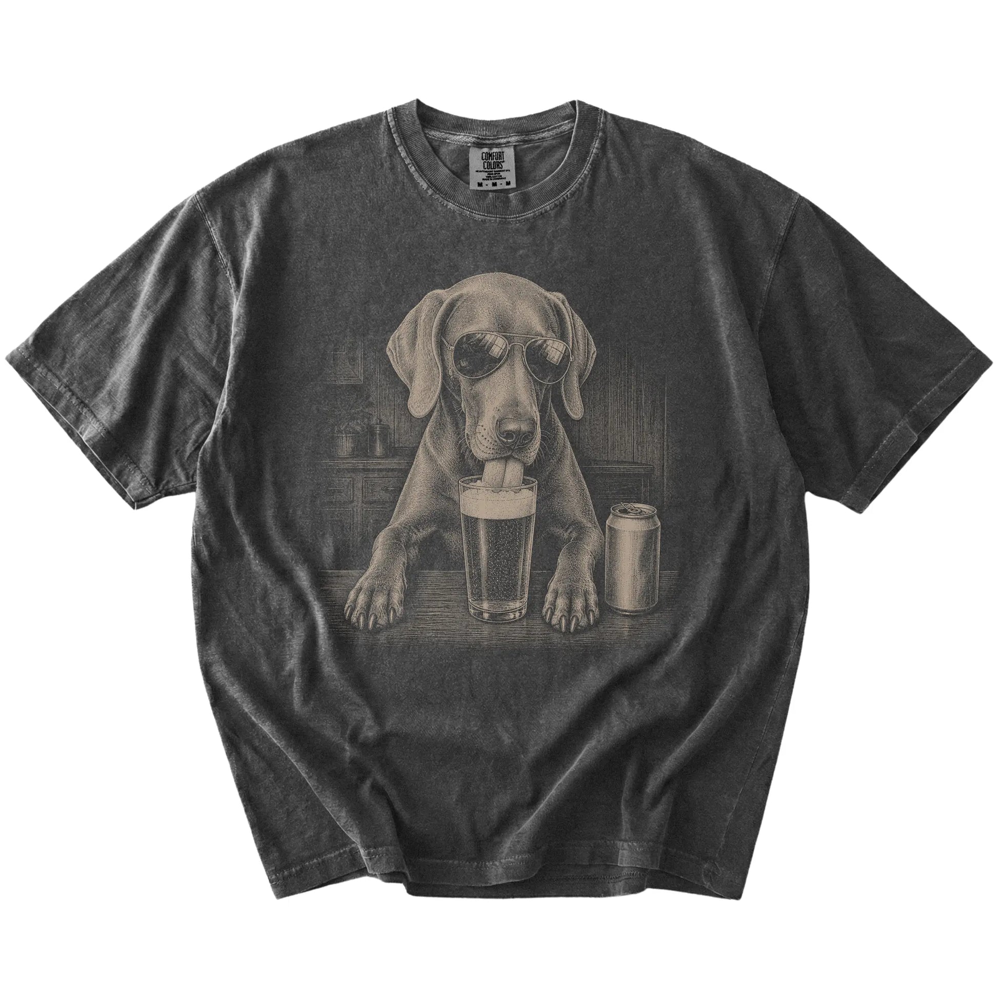 Weimaraner sneaking a drink from a foamy pint at home on a Pepper Comfort Colors® t-shirt