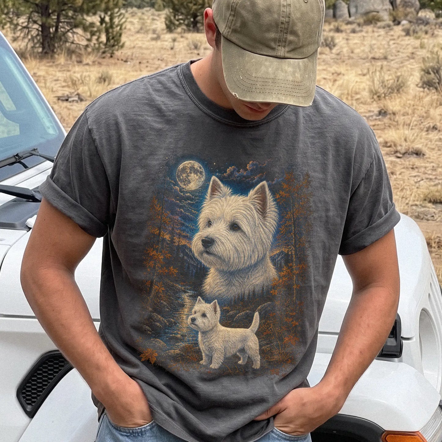 Model wearing a Pepper Comfort Colors® t-shirt featuring Westie in a moonlit fall forest