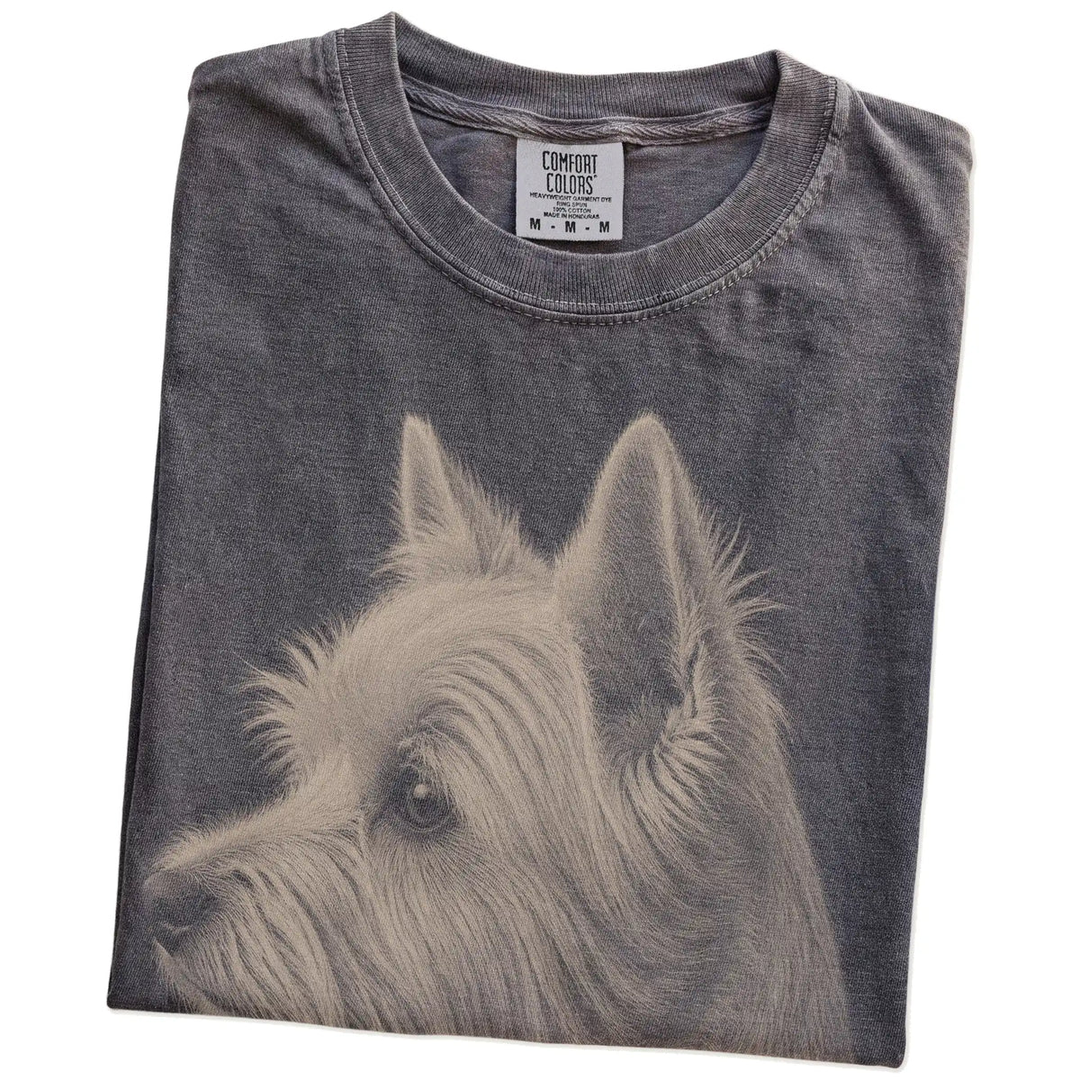 Folded Pepper Comfort Colors® T-shirt showing a detailed photographic portrait of a Westie