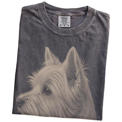 Folded Pepper Comfort Colors® T-shirt showing a detailed photographic portrait of a Westie