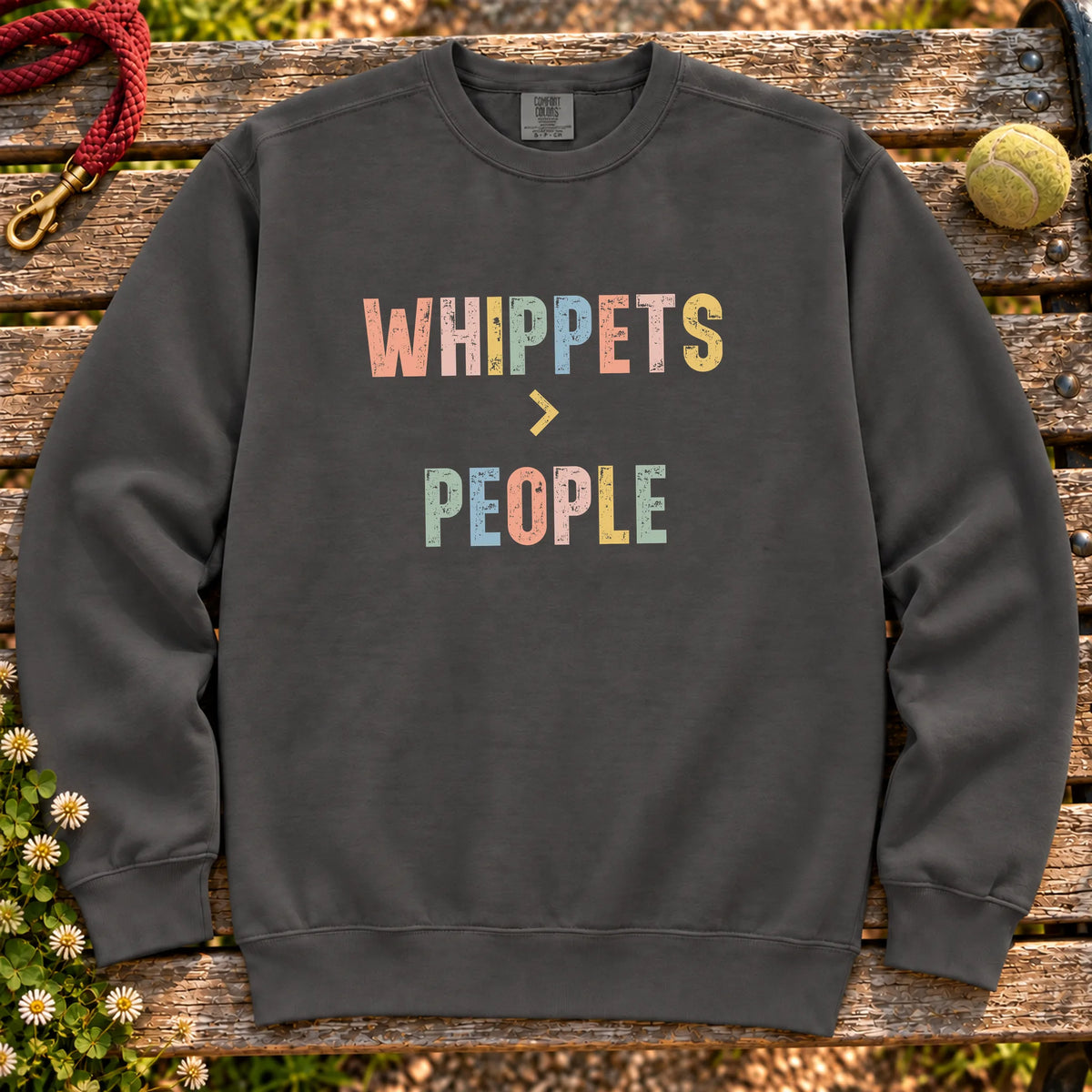 Whippets greater than people text design on a Pepper Comfort Colors sweatshirt