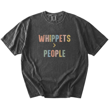 “Whippets > People” text on a Pepper Comfort Colors® T-shirt
