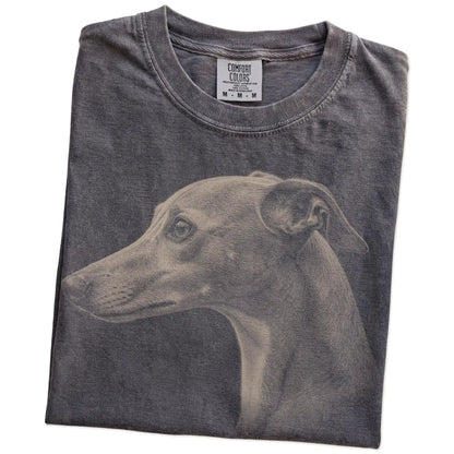 Folded Pepper Comfort Colors® T-shirt showing a detailed photographic portrait of a Whippet
