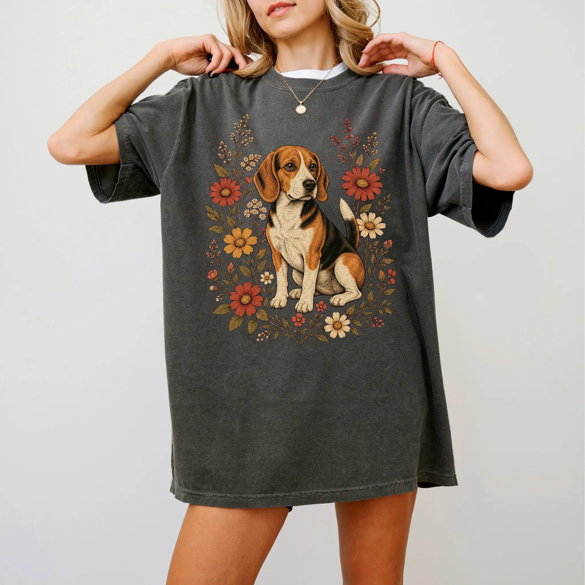 Model wearing a Pepper Comfort Colors® T-shirt showing Beagle portrait surrounded by wildflowers beneath the moon