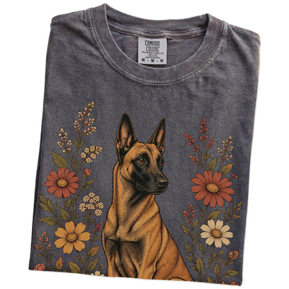 Folded Pepper Comfort Colors® T-shirt showing Belgian Malinois portrait surrounded by wildflowers beneath the moon