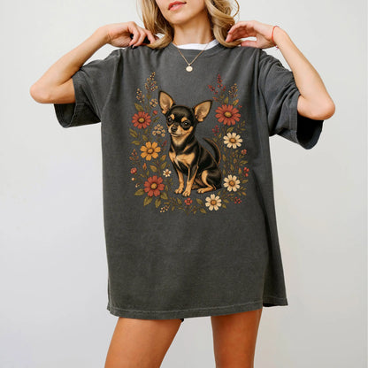Model wearing a Pepper Comfort Colors® T-shirt showing Chihuahua portrait surrounded by wildflowers beneath the moon