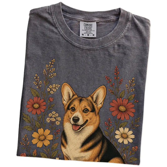 Folded Pepper Comfort Colors® T-shirt showing Corgi portrait surrounded by wildflowers beneath the moon