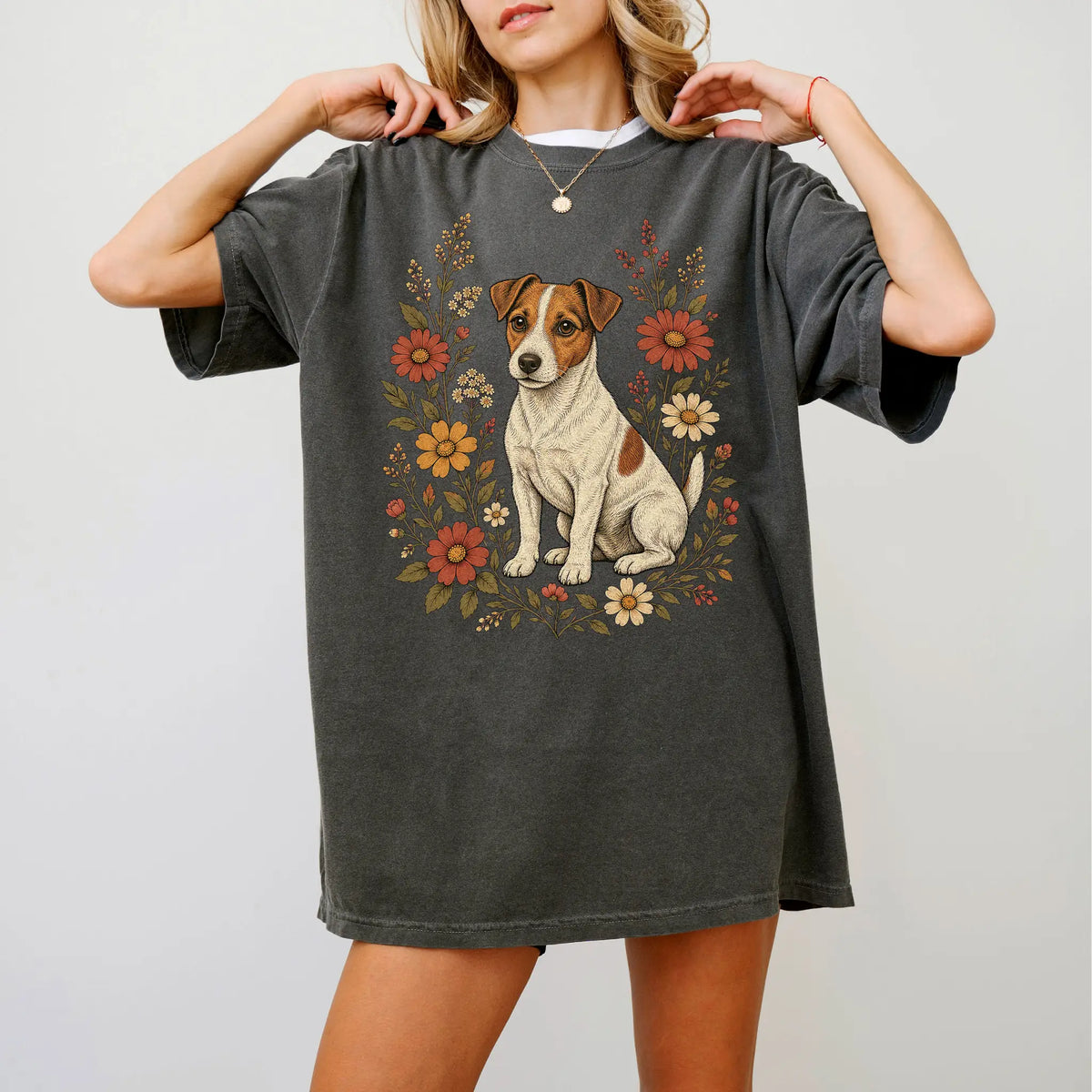 Model wearing a Pepper Comfort Colors® T-shirt showing Jack Russell portrait surrounded by wildflowers beneath the moon