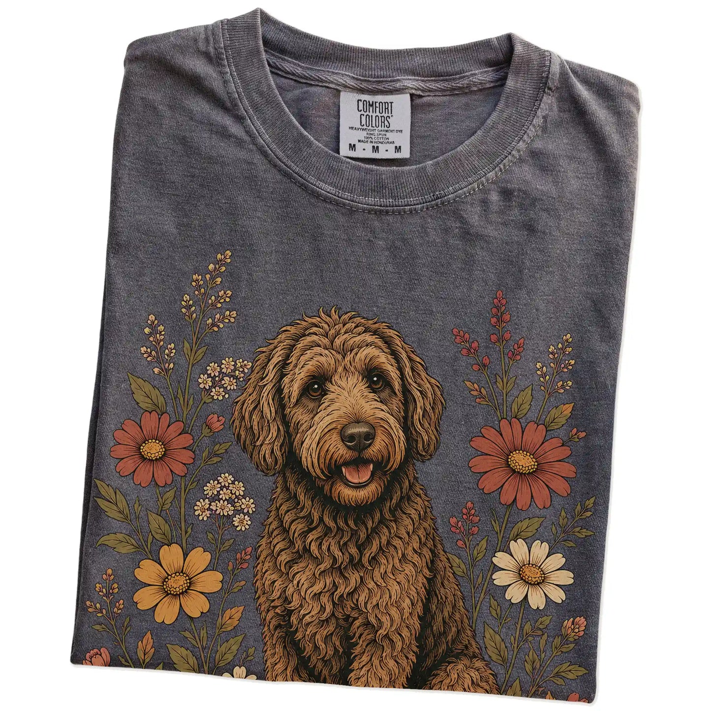 Folded Pepper Comfort Colors® T-shirt showing Labradoodle portrait surrounded by wildflowers beneath the moon