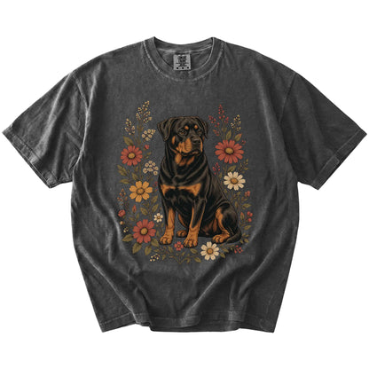 Rottweiler portrait surrounded by wildflowers beneath the moon on a Pepper Comfort Colors® T-shirt