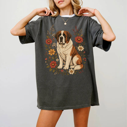 Model wearing a Pepper Comfort Colors® T-shirt showing Saint Bernard portrait surrounded by wildflowers beneath the moon