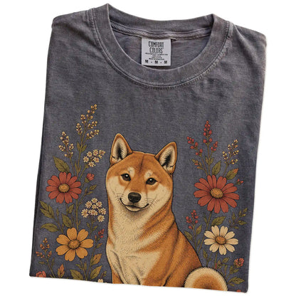 Folded Pepper Comfort Colors® T-shirt showing Shiba Inu portrait surrounded by wildflowers beneath the moon