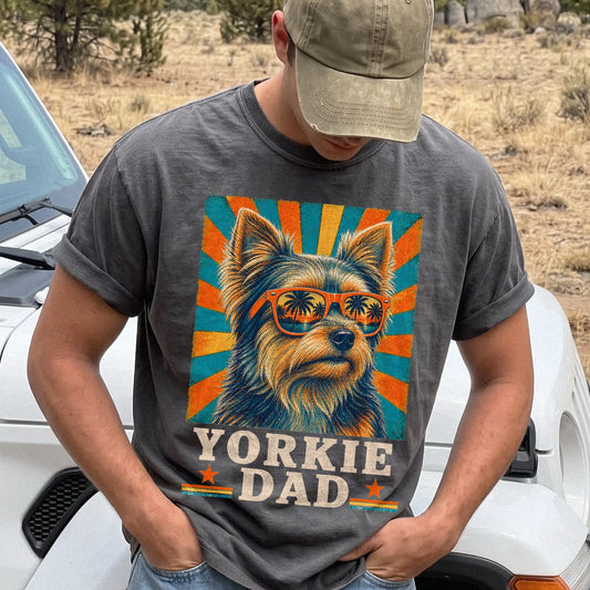 Retro Yorkie Dad design on a Pepper Comfort Colors T-shirt worn by a model
