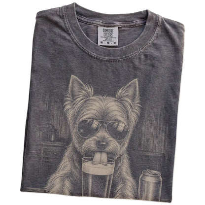 Folded Pepper Comfort Colors® t-shirt showing Yorkie sneaking a drink from a pint