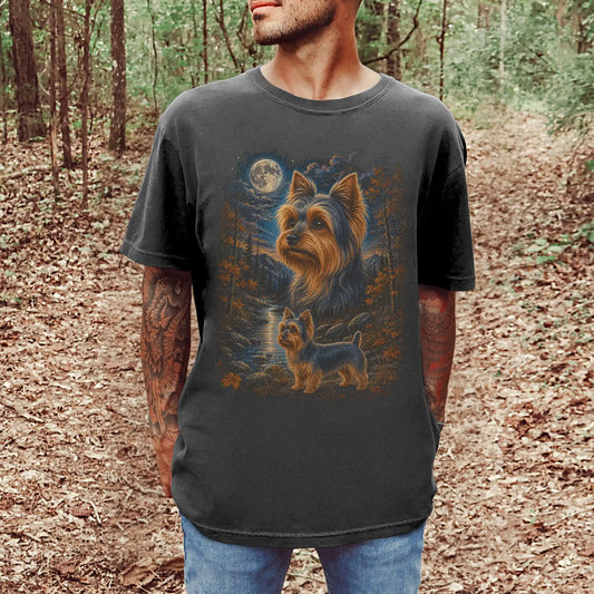 Model wearing a Pepper Comfort Colors® t-shirt featuring Yorkie in a moonlit fall forest