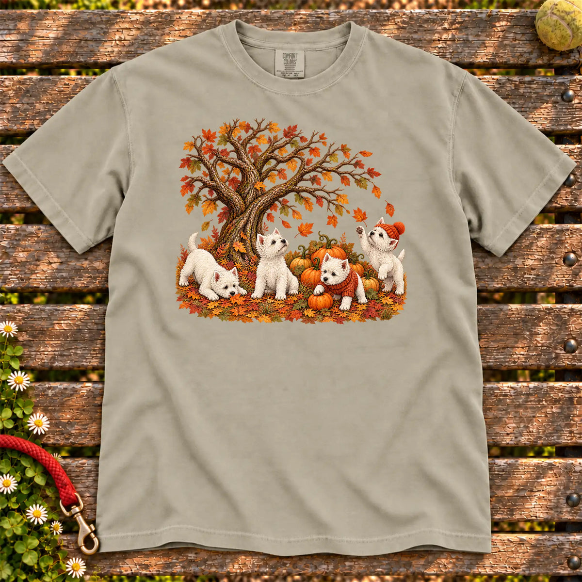 Four Westie puppies with pumpkins beneath an autumn tree on a Sandstone garment-dyed T-shirt
