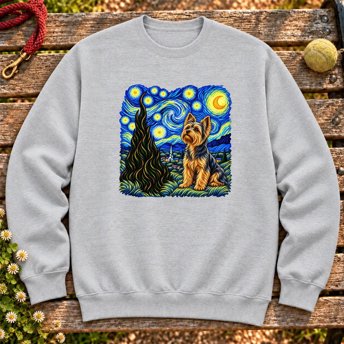 Colorful Yorkie beneath a swirling starry night sky on a Sport Grey sweatshirt