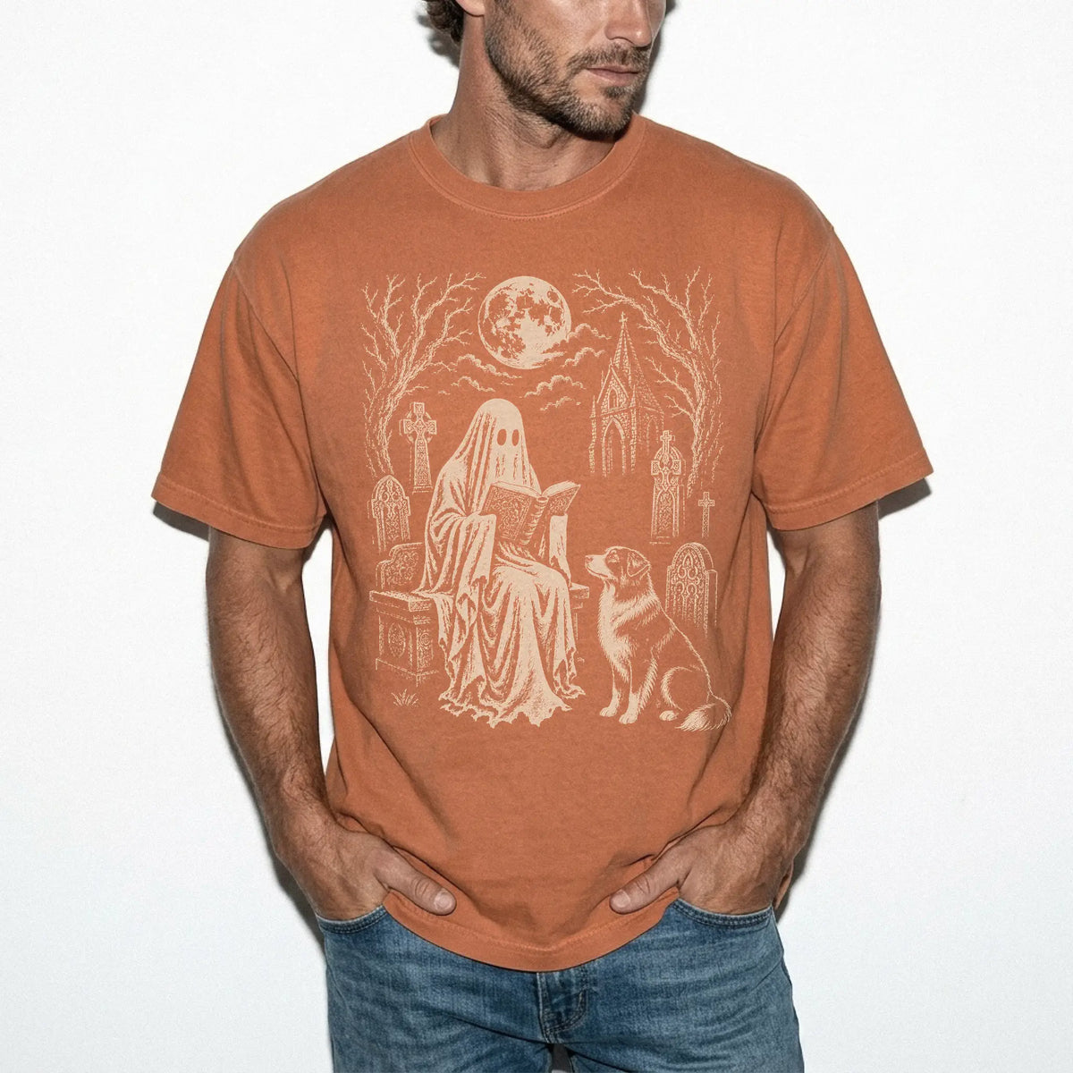 Model wearing a Yam Comfort Colors® T-shirt showing Australian Shepherd beside a reading ghost in a moonlit graveyard
