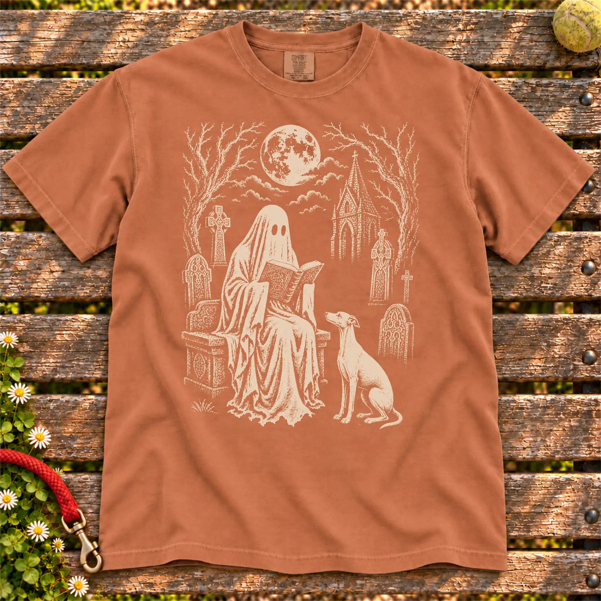 Whippet beside a reading ghost in a moonlit graveyard on a Yam Comfort Colors® T-shirt