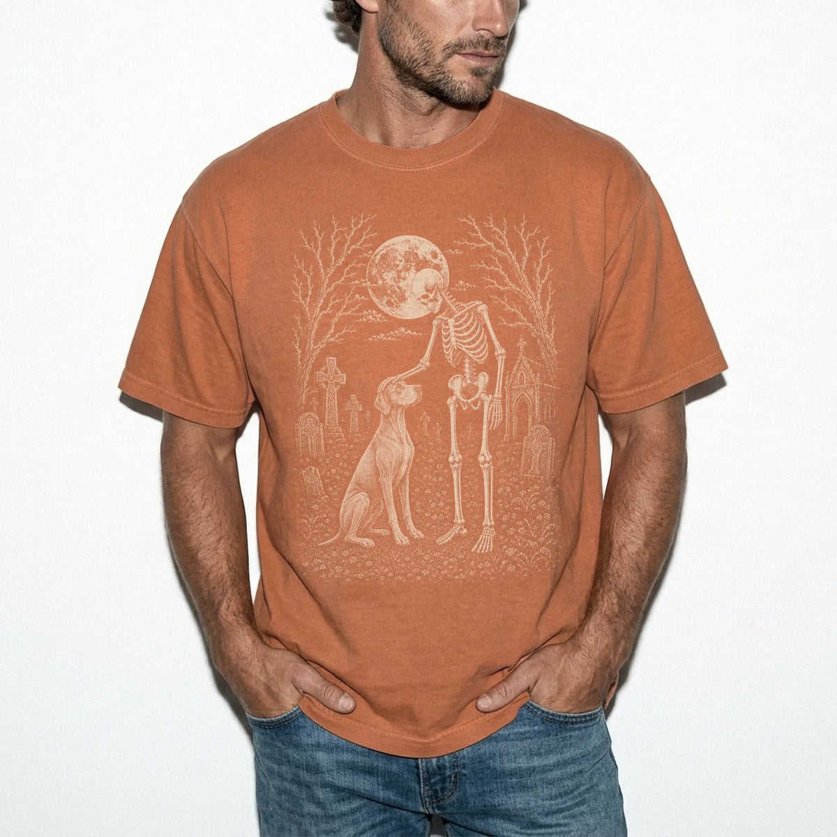 Model wearing a Yam Comfort Colors® T-shirt showing Vizsla sharing a quiet cemetery moment with a friendly skeleton