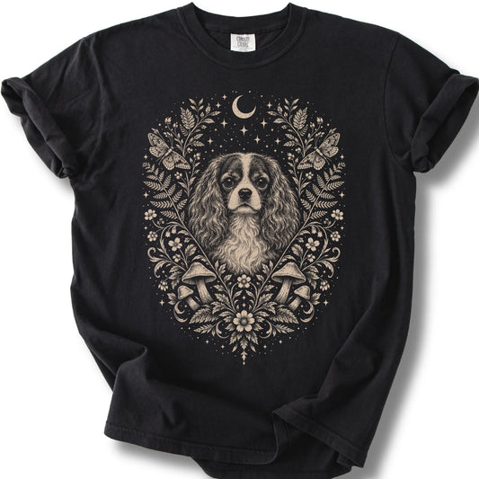 Cavalier King Charles Spaniel Cottagecore design on a black T-shirt.
