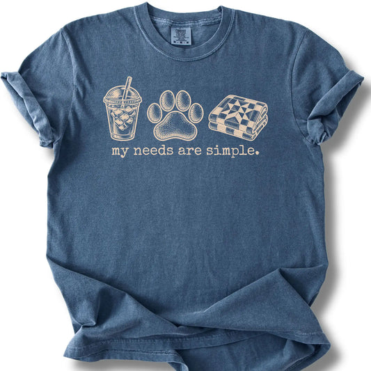 Iced coffee, a paw print and a quilt on a denim T-shirt.