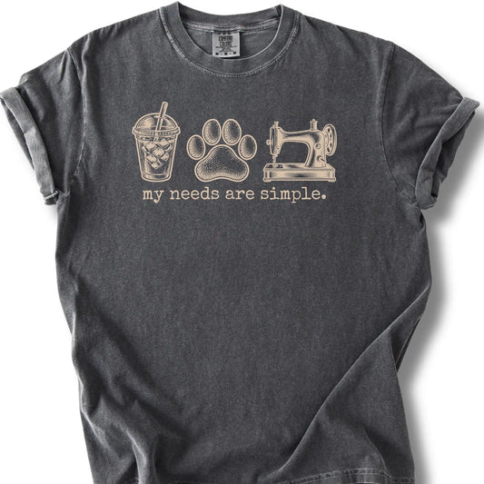 Iced coffee, a paw print and a sewing machine on a pepper T-shirt.