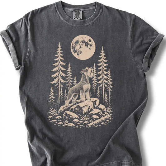 Standard Schnauzer howling beneath the moon on a pepper T-shirt.