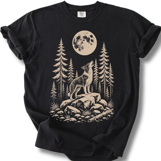 Border Collie howling beneath the moon on a black T-shirt.