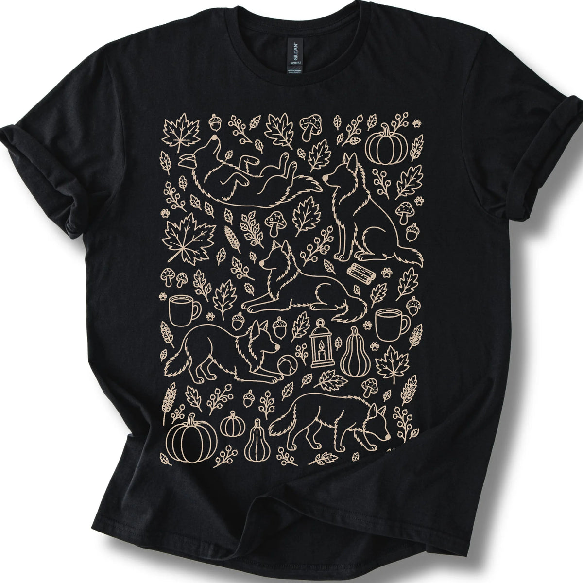 Border Collie among autumn leaves and seasonal icons on a black T-shirt.